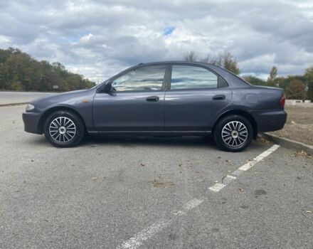 Серый Мазда 323, объемом двигателя 1.5 л и пробегом 370 тыс. км за 1699 $, фото 3 на Automoto.ua