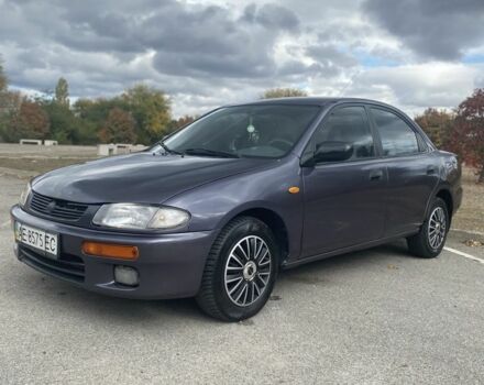 Серый Мазда 323, объемом двигателя 1.5 л и пробегом 370 тыс. км за 1699 $, фото 1 на Automoto.ua