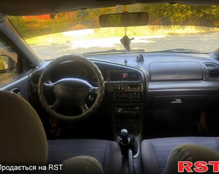 Сірий Мазда 323, об'ємом двигуна 1.5 л та пробігом 220 тис. км за 1490 $, фото 6 на Automoto.ua
