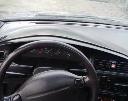 Серый Мазда 323, объемом двигателя 1.5 л и пробегом 500 тыс. км за 2000 $, фото 2 на Automoto.ua