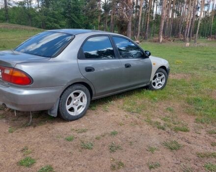 Сірий Мазда 323, об'ємом двигуна 1.5 л та пробігом 294 тис. км за 2000 $, фото 2 на Automoto.ua