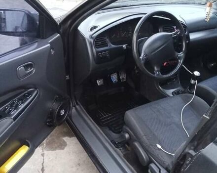 Серый Мазда 323, объемом двигателя 1.5 л и пробегом 500 тыс. км за 2000 $, фото 1 на Automoto.ua