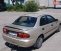 Серый Мазда 323, объемом двигателя 1.5 л и пробегом 390 тыс. км за 2500 $, фото 1 на Automoto.ua
