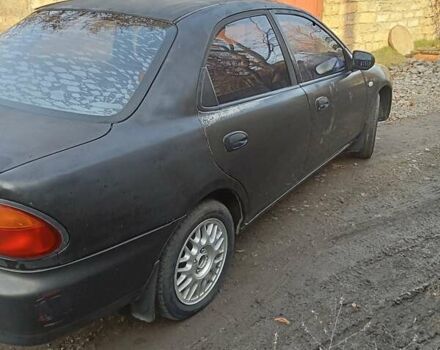 Серый Мазда 323, объемом двигателя 1.5 л и пробегом 500 тыс. км за 2000 $, фото 9 на Automoto.ua