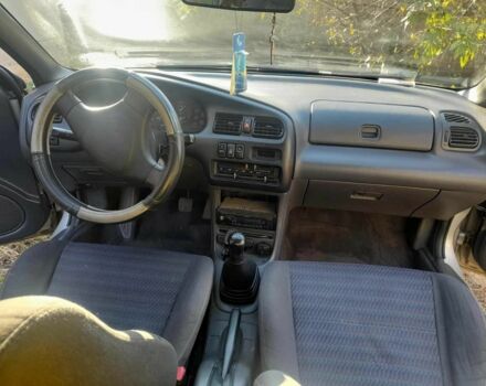 Серый Мазда 323, объемом двигателя 1.5 л и пробегом 2 тыс. км за 1000 $, фото 2 на Automoto.ua