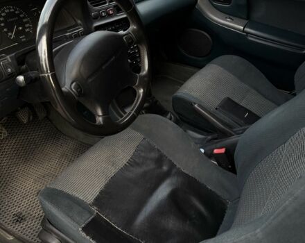 Серый Мазда 323, объемом двигателя 1.5 л и пробегом 335 тыс. км за 3300 $, фото 7 на Automoto.ua