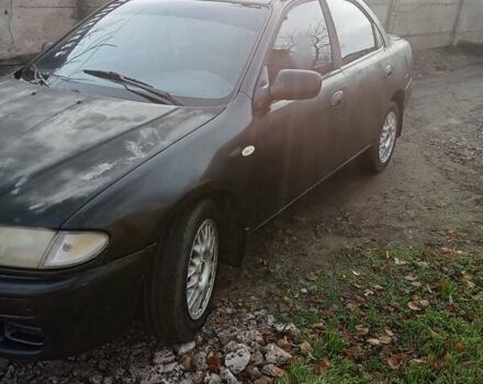 Серый Мазда 323, объемом двигателя 1.5 л и пробегом 500 тыс. км за 2000 $, фото 10 на Automoto.ua