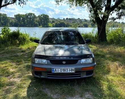 Сірий Мазда 323, об'ємом двигуна 1.5 л та пробігом 220 тис. км за 1490 $, фото 1 на Automoto.ua
