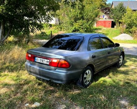 Сірий Мазда 323, об'ємом двигуна 1.5 л та пробігом 220 тис. км за 1490 $, фото 2 на Automoto.ua