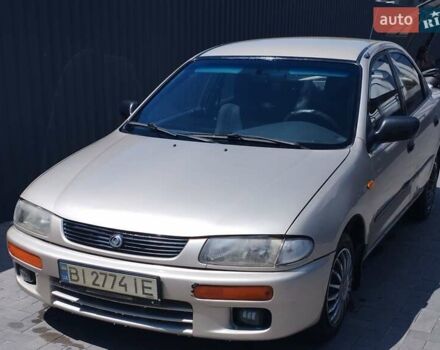 Серый Мазда 323, объемом двигателя 1.5 л и пробегом 390 тыс. км за 2600 $, фото 2 на Automoto.ua