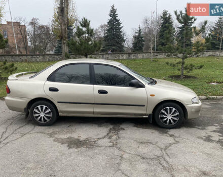 Серый Мазда 323, объемом двигателя 1.5 л и пробегом 286 тыс. км за 2450 $, фото 2 на Automoto.ua