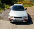 Серый Мазда 323, объемом двигателя 1.5 л и пробегом 270 тыс. км за 2000 $, фото 1 на Automoto.ua