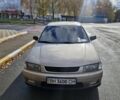 Серый Мазда 323, объемом двигателя 2 л и пробегом 234 тыс. км за 1350 $, фото 1 на Automoto.ua