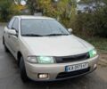 Сірий Мазда 323, об'ємом двигуна 1.5 л та пробігом 201 тис. км за 1399 $, фото 1 на Automoto.ua