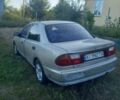 Сірий Мазда 323, об'ємом двигуна 0 л та пробігом 253 тис. км за 1699 $, фото 1 на Automoto.ua