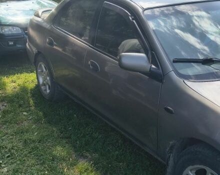Сірий Мазда 323, об'ємом двигуна 1.5 л та пробігом 407 тис. км за 2050 $, фото 5 на Automoto.ua