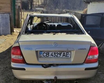 Серый Мазда 323, объемом двигателя 1.5 л и пробегом 400 тыс. км за 500 $, фото 4 на Automoto.ua