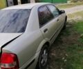 Мазда 323 1999 в Киеве на Automoto.ua Серый Мазда 323, объемом двигателя 1.8 л и пробегом 900 тыс. км за 2600 $, фото 1 на Automoto.ua