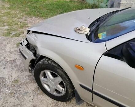 Мазда 323 1999 в Киеве на Automoto.ua Серый Мазда 323, объемом двигателя 1.8 л и пробегом 900 тыс. км за 2600 $, фото 4 на Automoto.ua