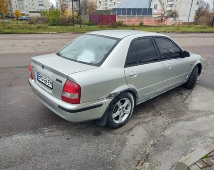 Сірий Мазда 323, об'ємом двигуна 1.5 л та пробігом 100 тис. км за 2200 $, фото 3 на Automoto.ua