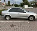 Сірий Мазда 323, об'ємом двигуна 1.5 л та пробігом 250 тис. км за 2500 $, фото 2 на Automoto.ua