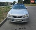 Серый Мазда 323, объемом двигателя 1.6 л и пробегом 314 тыс. км за 2200 $, фото 1 на Automoto.ua