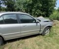 Сірий Мазда 323, об'ємом двигуна 1.6 л та пробігом 250 тис. км за 748 $, фото 1 на Automoto.ua