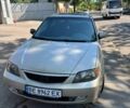 Серый Мазда 323, объемом двигателя 2 л и пробегом 230 тыс. км за 1250 $, фото 1 на Automoto.ua