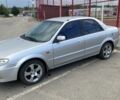 Серый Мазда 323, объемом двигателя 1.6 л и пробегом 295 тыс. км за 3300 $, фото 1 на Automoto.ua