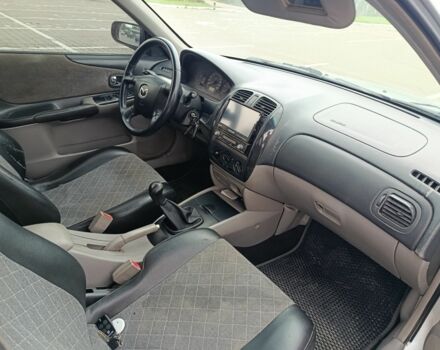 Серый Мазда 323, объемом двигателя 1.6 л и пробегом 370 тыс. км за 2300 $, фото 1 на Automoto.ua