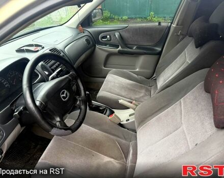 Серый Мазда 323, объемом двигателя 1.6 л и пробегом 35 тыс. км за 2300 $, фото 3 на Automoto.ua