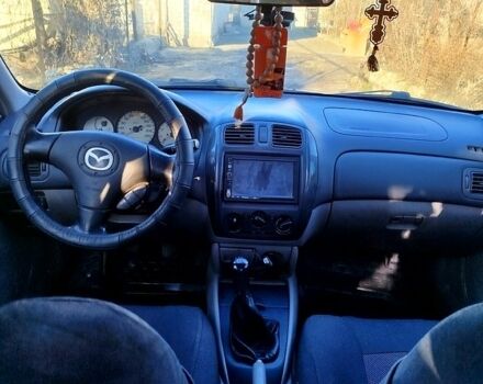Сірий Мазда 323, об'ємом двигуна 1.6 л та пробігом 266 тис. км за 3199 $, фото 7 на Automoto.ua