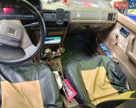 Серый Мазда 323, объемом двигателя 1.7 л и пробегом 520 тыс. км за 402 $, фото 6 на Automoto.ua
