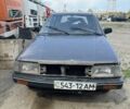 Серый Мазда 323, объемом двигателя 1.7 л и пробегом 300 тыс. км за 454 $, фото 1 на Automoto.ua