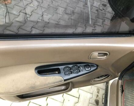 Серый Мазда 323, объемом двигателя 0 л и пробегом 15 тыс. км за 1500 $, фото 4 на Automoto.ua