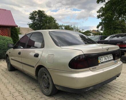 Серый Мазда 323, объемом двигателя 0 л и пробегом 15 тыс. км за 1500 $, фото 7 на Automoto.ua
