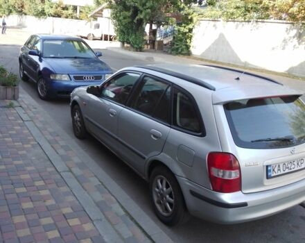 Серый Мазда 323, объемом двигателя 1.5 л и пробегом 150 тыс. км за 1300 $, фото 1 на Automoto.ua