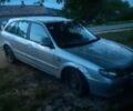 Серый Мазда 323, объемом двигателя 2 л и пробегом 200 тыс. км за 650 $, фото 1 на Automoto.ua
