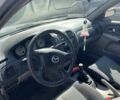 Серый Мазда 323, объемом двигателя 2 л и пробегом 223 тыс. км за 802 $, фото 3 на Automoto.ua