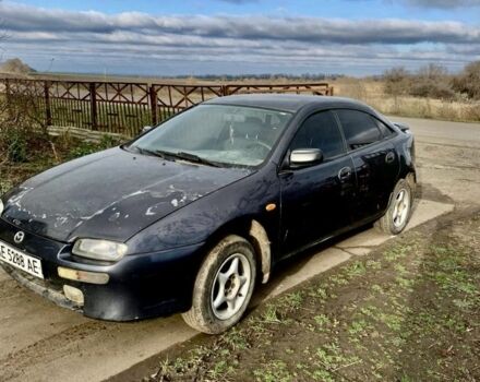 Сірий Мазда 323, об'ємом двигуна 1.5 л та пробігом 300 тис. км за 1200 $, фото 3 на Automoto.ua