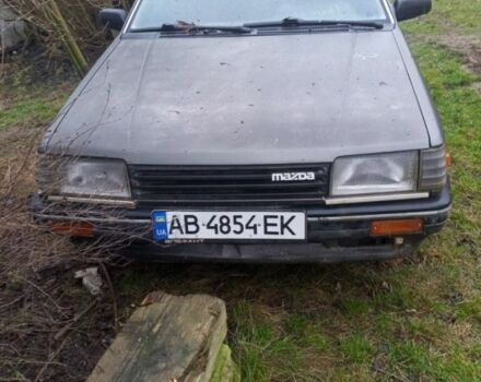 Серый Мазда 323, объемом двигателя 1.5 л и пробегом 313 тыс. км за 250 $, фото 1 на Automoto.ua
