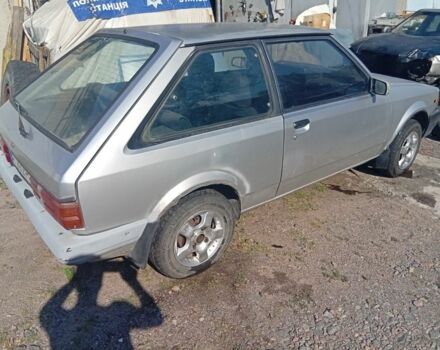 Серый Мазда 323, объемом двигателя 0 л и пробегом 123 тыс. км за 568 $, фото 1 на Automoto.ua