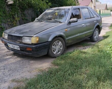 Серый Мазда 323, объемом двигателя 0 л и пробегом 350 тыс. км за 605 $, фото 1 на Automoto.ua