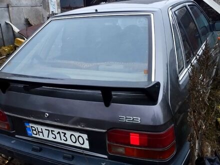 Сірий Мазда 323, об'ємом двигуна 1.3 л та пробігом 0 тис. км за 700 $, фото 1 на Automoto.ua