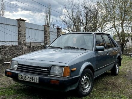 Мазда 323 1986 у Новом Буге на Automoto.ua Сірий Мазда 323, об'ємом двигуна 1 л та пробігом 110 тис. км за 18000 $, фото 1 на Automoto.ua