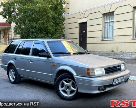 Сірий Мазда 323, об'ємом двигуна 1.5 л та пробігом 400 тис. км за 750 $, фото 1 на Automoto.ua
