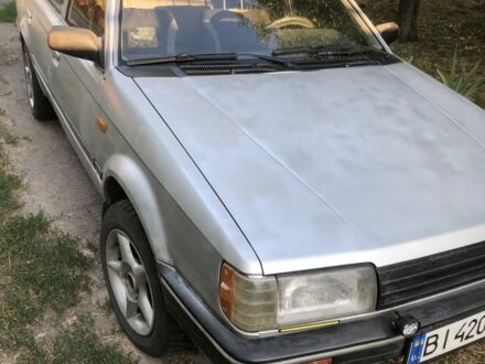 Серый Мазда 323, объемом двигателя 1.3 л и пробегом 290 тыс. км за 1150 $, фото 1 на Automoto.ua