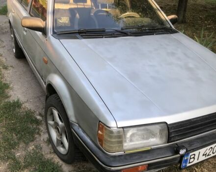Серый Мазда 323, объемом двигателя 1.3 л и пробегом 290 тыс. км за 1150 $, фото 1 на Automoto.ua