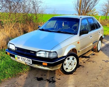 Сірий Мазда 323, об'ємом двигуна 1.3 л та пробігом 454 тис. км за 850 $, фото 1 на Automoto.ua