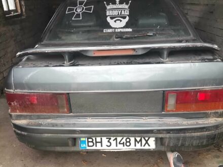 Сірий Мазда 323, об'ємом двигуна 2 л та пробігом 200 тис. км за 306 $, фото 1 на Automoto.ua